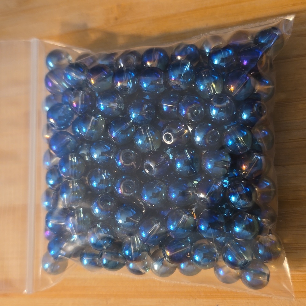 8mm Shimmery Blue Glass beads (man made material)